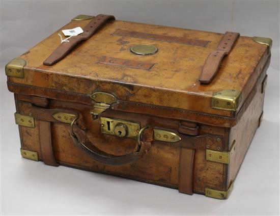 A Holland and Holland leather covered oak ammunition box length 41cm